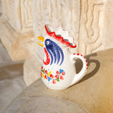 Red rooster pitcher