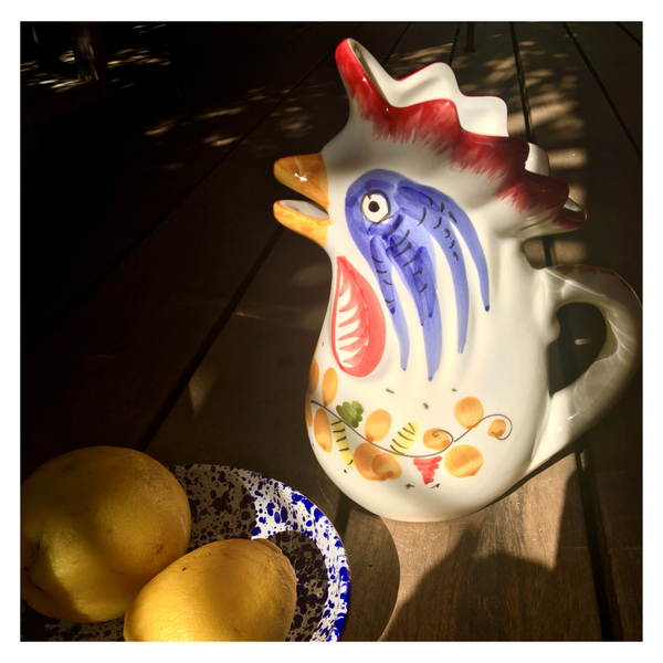 yellow ceramic pitcher from Italy