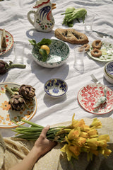 Colourful table with Italian ceramic tableware